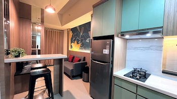 Warm And Homey 2Br At Vida View Makassar Apartment,,3 star