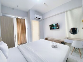 Minimalistic And Cozy Studio Amartha View Apartment,,2 star