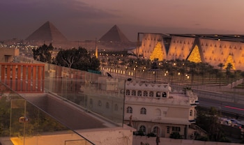 kush hotel grand museum and pyramids view