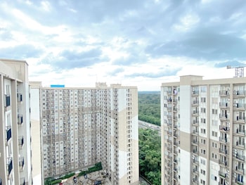 warm and homey 2br at podomoro golf view apartment