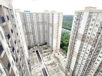 warm and homey 2br at podomoro golf view apartment