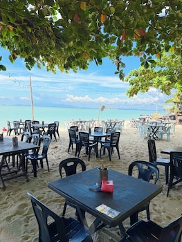 rainbow paradise beach resort by lwe