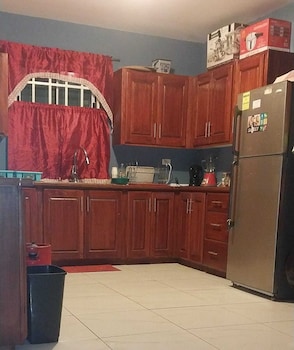 Charming Piarco Home With Garden View,,2 star