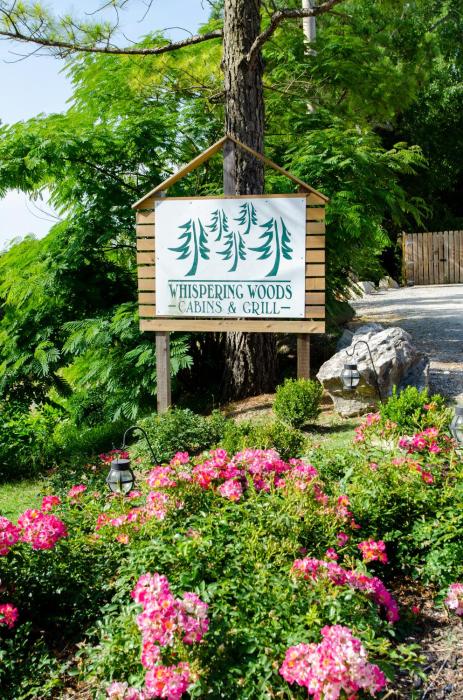 whispering woods cabins and grill