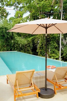 hidden city ubud modern villas and townhouses with private pools nature views and wellness access