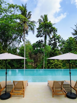 hidden city ubud modern villas and townhouses with private pools nature views and wellness access