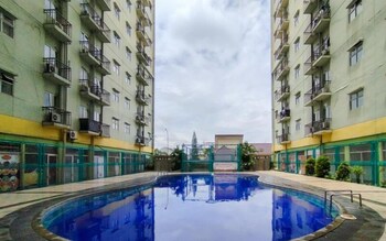 the modern 2br at suites metro apartment