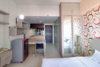 modern cozy studio at the square surabaya apartment