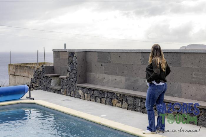 sunset pool house in feteira