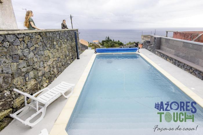 sunset pool house in feteira