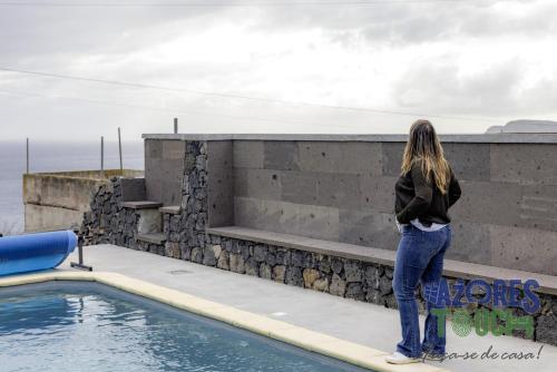 sunset pool house in feteira