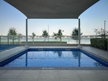 maison privee modern hideaway with canal views on yas island
