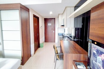 comfy and classic studio at grand sungkono lagoon apartment