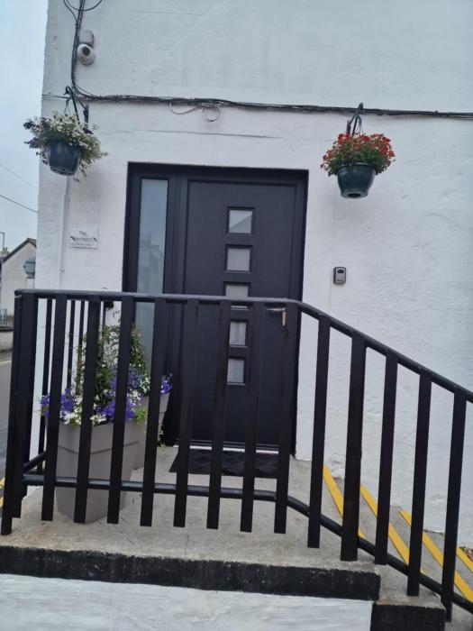 the courtyard bar kitchen and rooms