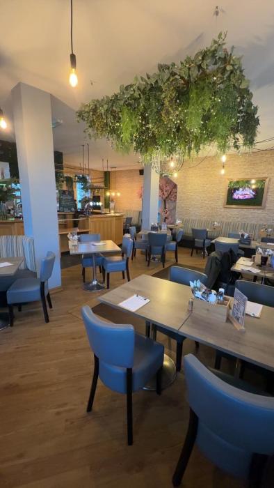 the courtyard bar kitchen and rooms
