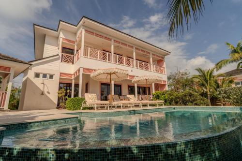 private pool villa at coral sands steps to pink sand beach and resort amenities