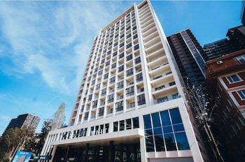 next white aparthotel official