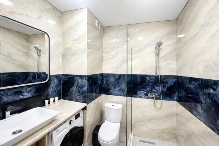 next white aparthotel official
