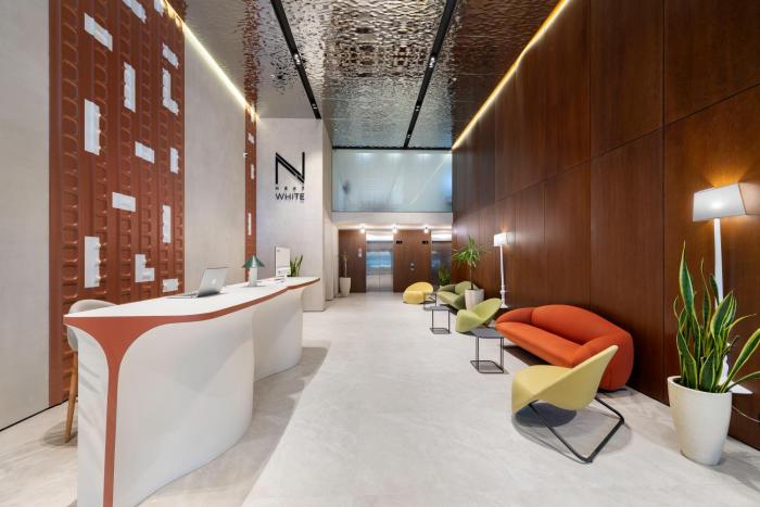 next white aparthotel official