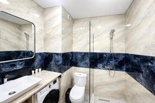 next white aparthotel official