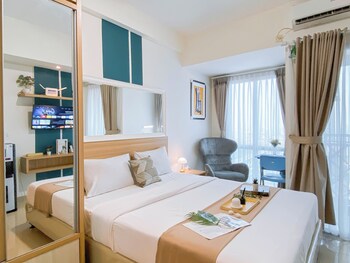 cozy and modern style studio at grand dhika city apartment