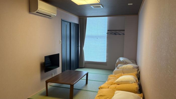 hotel cross base tosu station