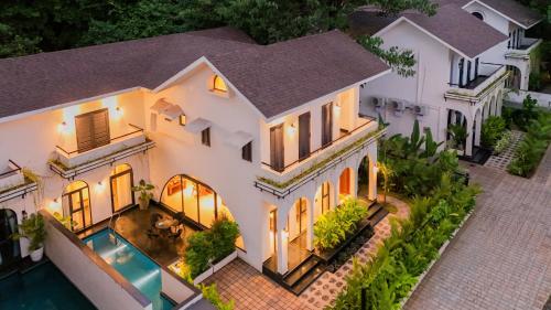bellavie 3 bhk villa with private pool and tv lounge area in a gated complex
