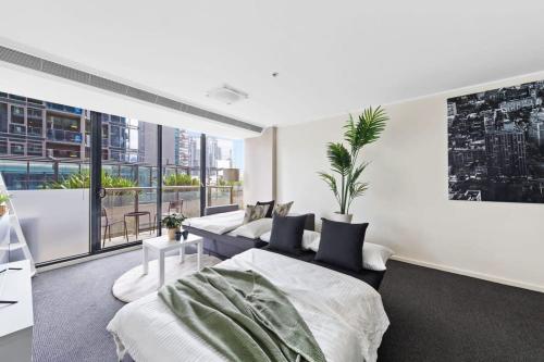 a large 2br apt near crown sleeps 8 free parking