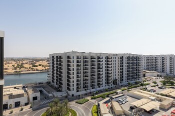 maison privee sleek yas getaway w ferrari world and canal views