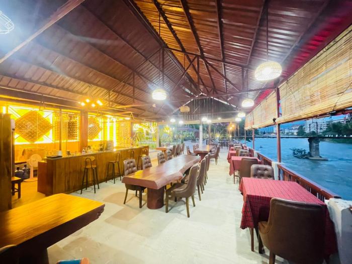 intimate riverside resort