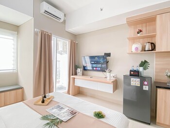 soft ivory studio at royal sentul park apartment