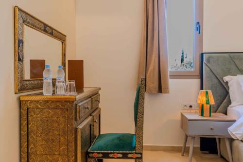 riad tammam