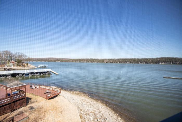 poolside condo with amazing lake views and design
