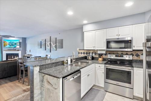 lakeview condo w 2 pools and beach family fun awaits at 21mm