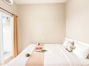 cream tone 1br at royal sentul park apartment