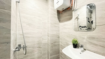 modern look studio room at collins boulevard apartment