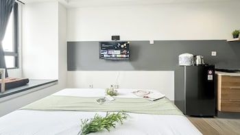 modern look studio room at collins boulevard apartment
