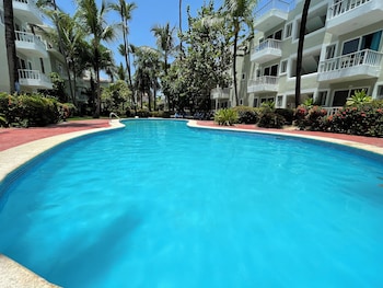 deluxe studios hotel pool and beach