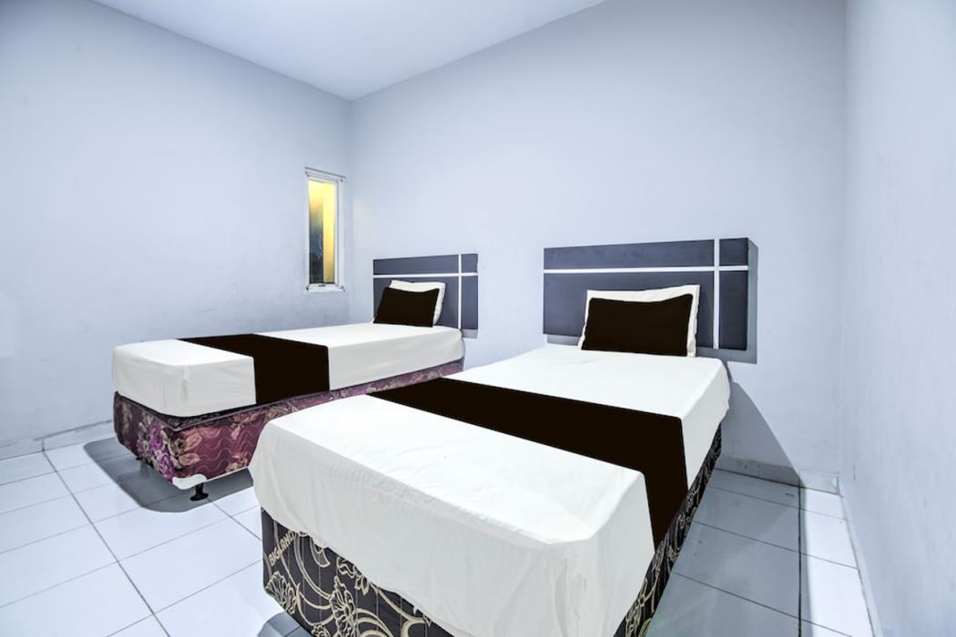 hotel o makassar near mall panakukang formerly hotel lucky inn makassar
