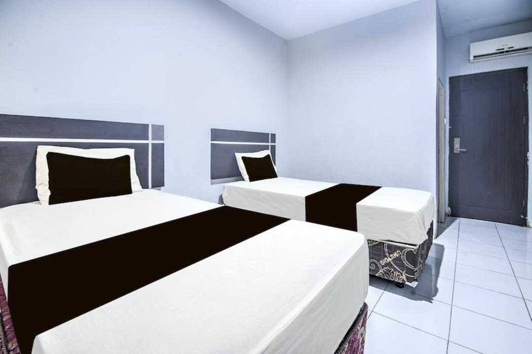 hotel o makassar near mall panakukang formerly hotel lucky inn makassar