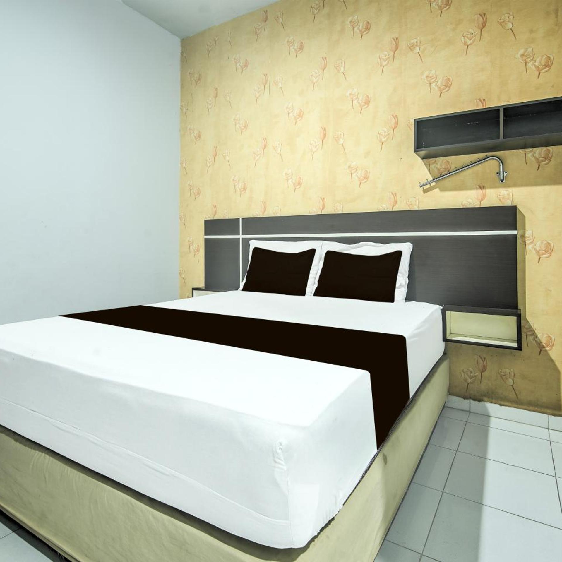 hotel o makassar near mall panakukang formerly hotel lucky inn makassar