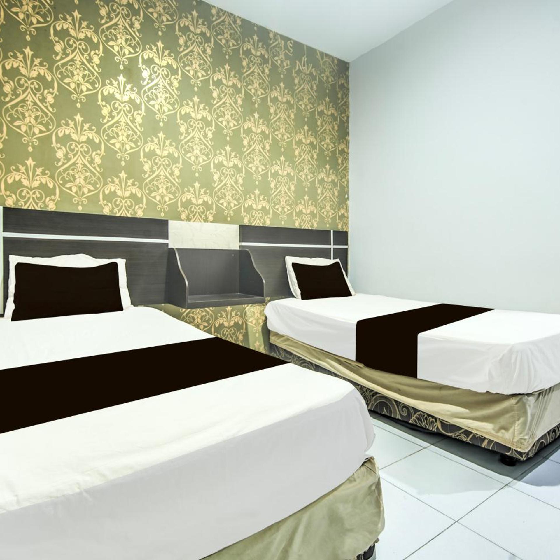 hotel o makassar near mall panakukang formerly hotel lucky inn makassar