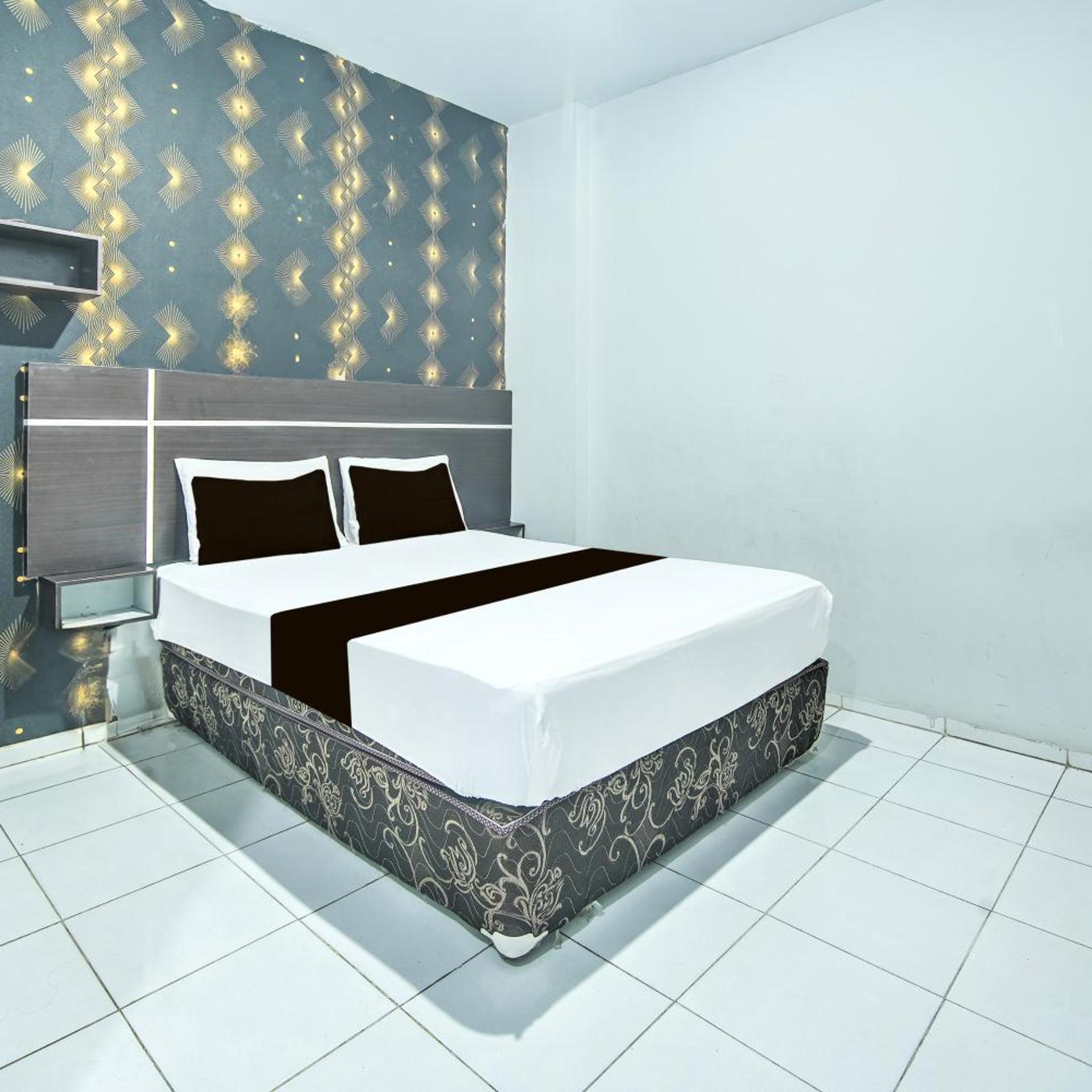 hotel o makassar near mall panakukang formerly hotel lucky inn makassar