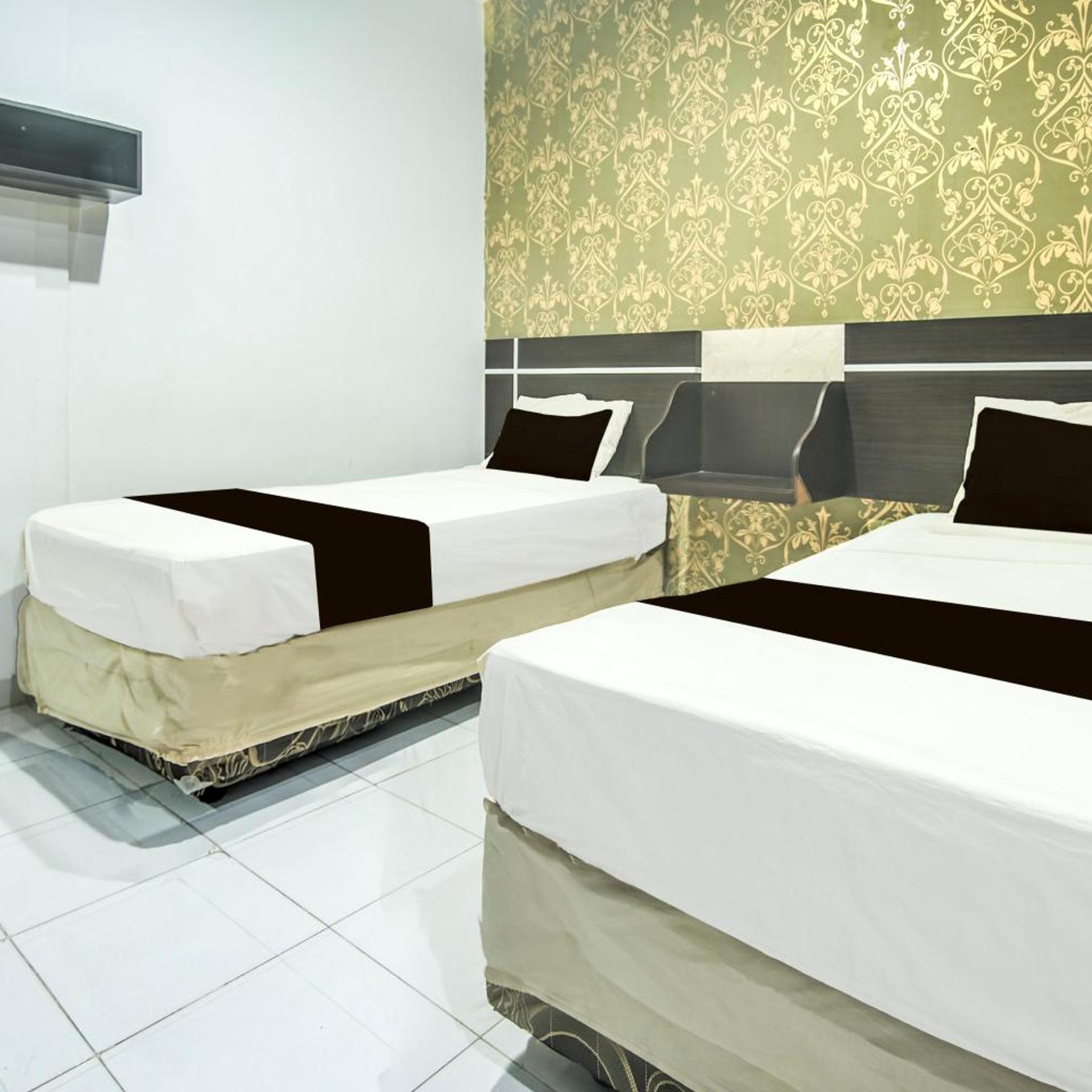 hotel o makassar near mall panakukang formerly hotel lucky inn makassar