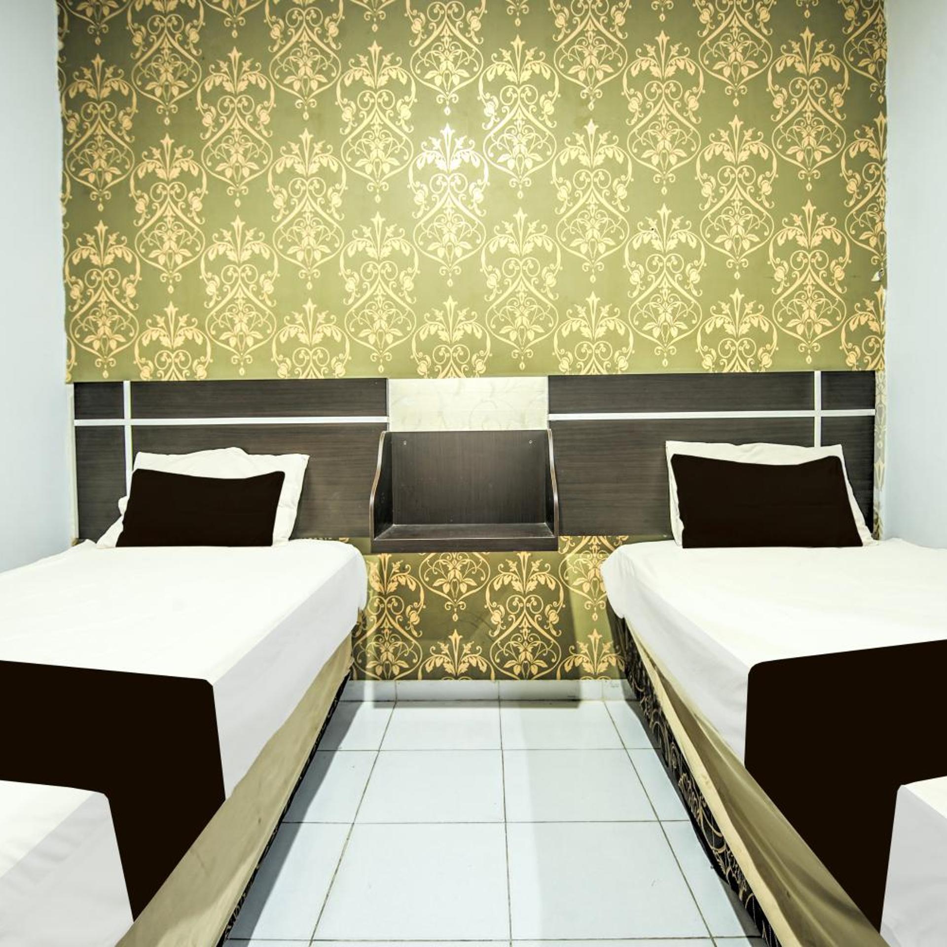 hotel o makassar near mall panakukang formerly hotel lucky inn makassar