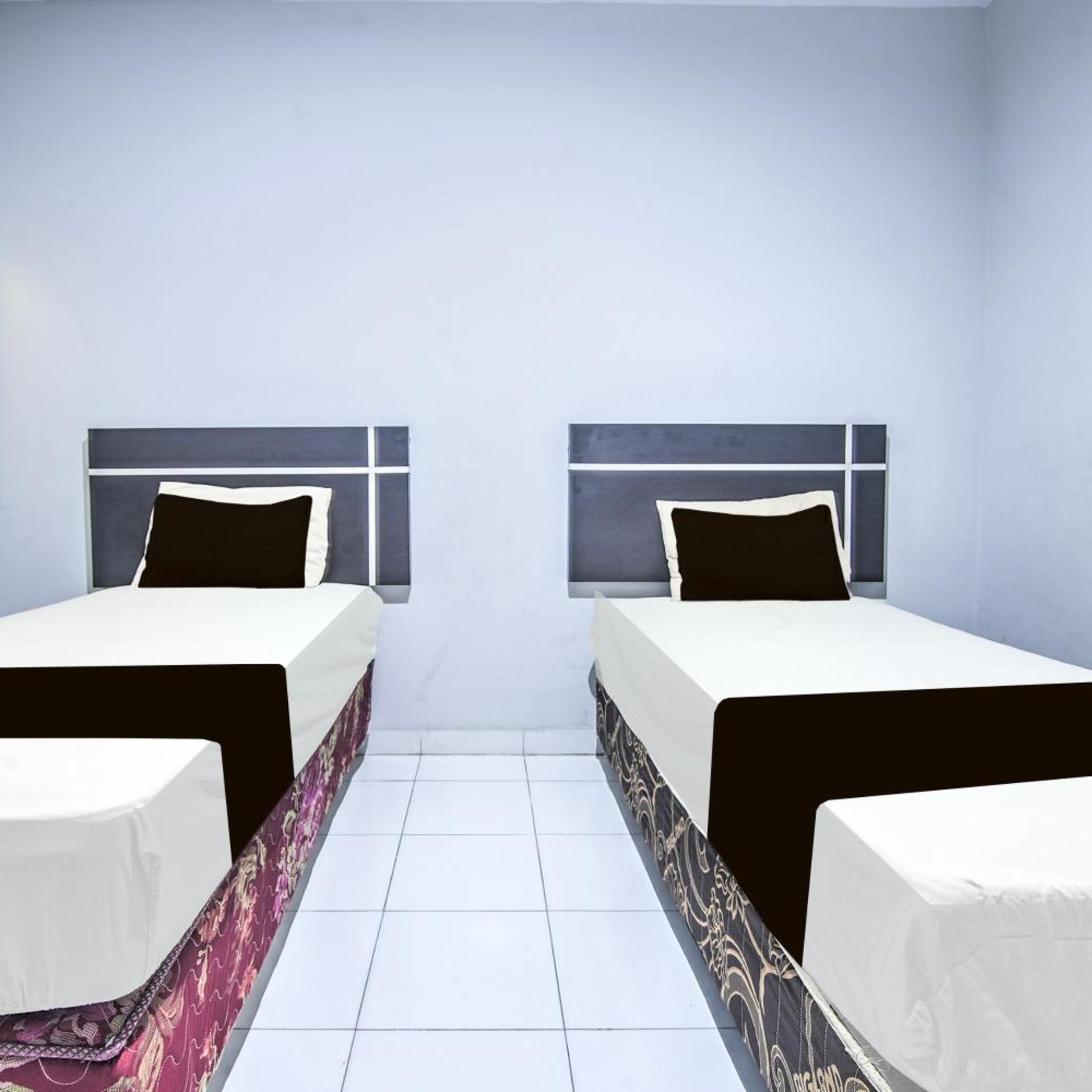 hotel o makassar near mall panakukang formerly hotel lucky inn makassar