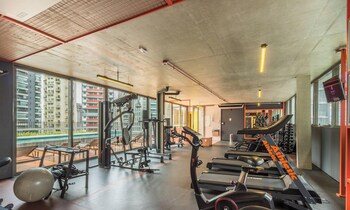 modern accommodations in a building with a pool in the heart of sp yhes