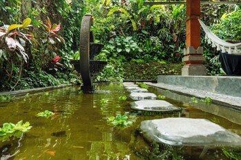 barong retreat villa ubud with hammock terrace garden and koi pond