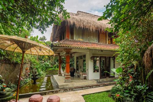 barong retreat villa ubud with hammock terrace garden and koi pond