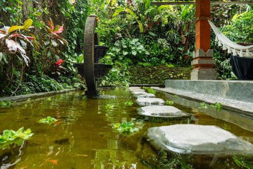 barong retreat villa ubud with hammock terrace garden and koi pond